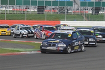 A huge field of Compact Cup cars on the International Circuit