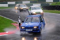 Classic Stock Hatch cars splashing through the mountain